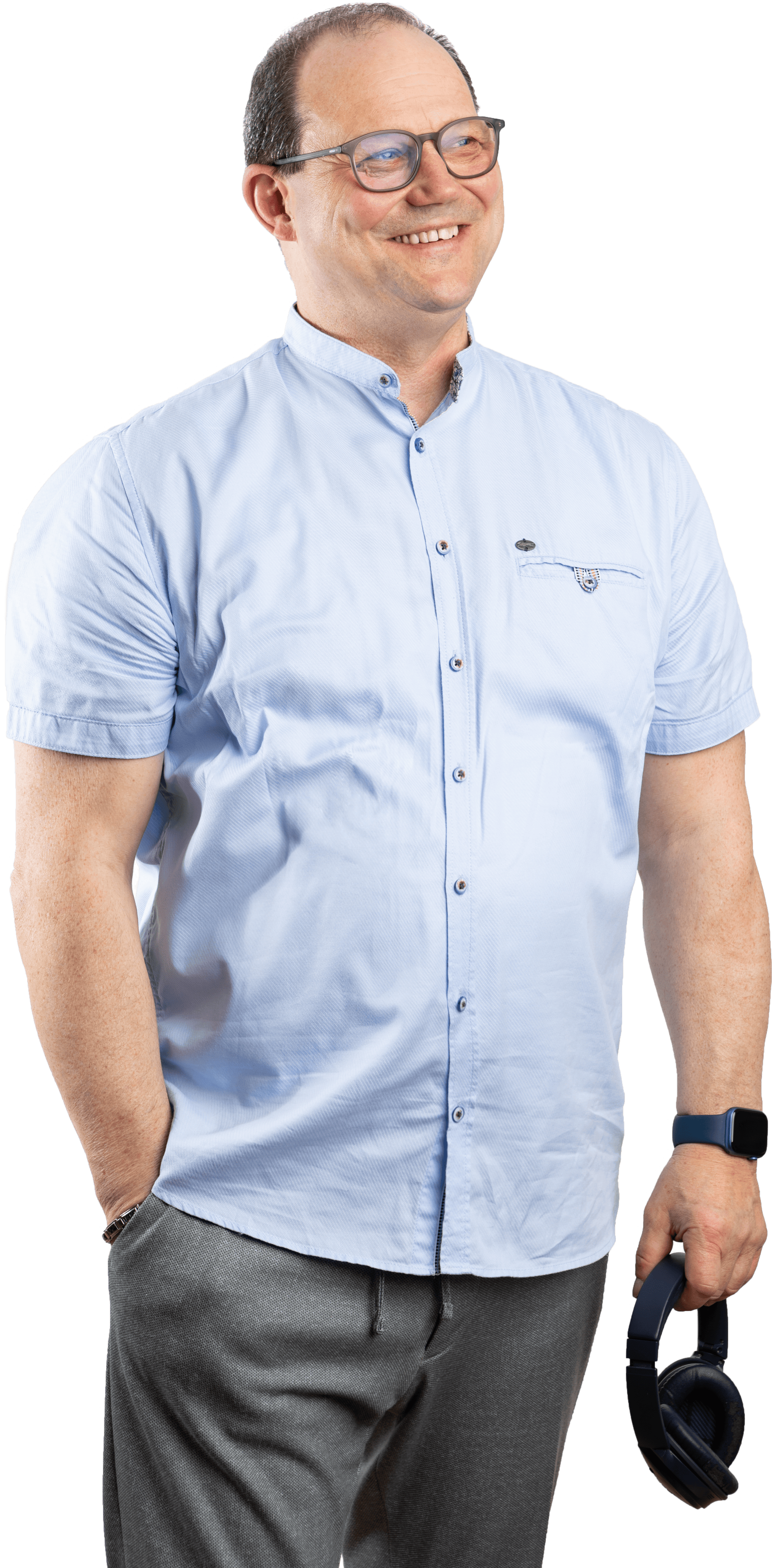 Andreas mit Kopfhörer in einer Hand